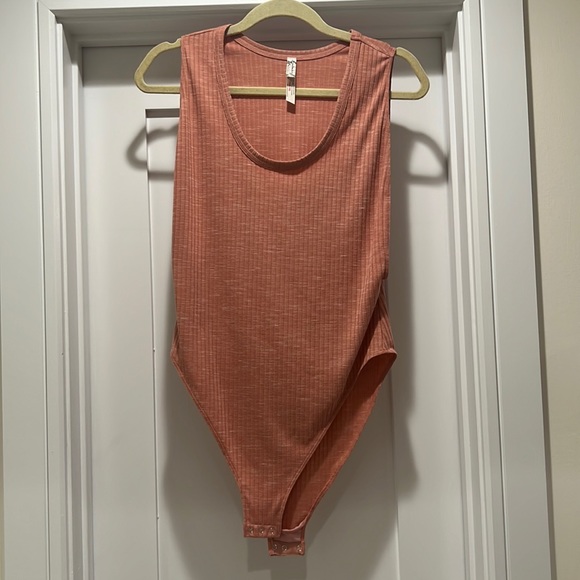 Free People Tops - Free People coral no sleeve bodysuit - size medium